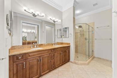 Behind a breathtaking guard-gated entrance, manicured on Parkland Golf Club in Florida - for sale on GolfHomes.com, golf home, golf lot