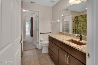 Discover this impeccably maintained pool home located on the on Plantation Bay Golf and Country Club in Florida - for sale on GolfHomes.com, golf home, golf lot