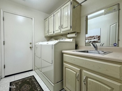 Welcome to this BEAUTIFULLY REFRESHED home located on a on Palo Verde Golf and Country Club in Arizona - for sale on GolfHomes.com, golf home, golf lot