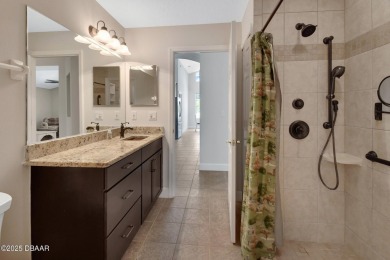 Discover this impeccably maintained pool home located on the on Plantation Bay Golf and Country Club in Florida - for sale on GolfHomes.com, golf home, golf lot