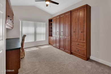 Discover this impeccably maintained pool home located on the on Plantation Bay Golf and Country Club in Florida - for sale on GolfHomes.com, golf home, golf lot