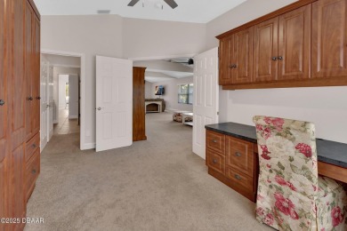 Discover this impeccably maintained pool home located on the on Plantation Bay Golf and Country Club in Florida - for sale on GolfHomes.com, golf home, golf lot