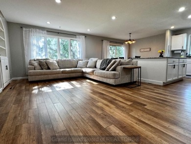 This charming home sits on a large lot with mature trees on the on Indianhead Golf Club in Nebraska - for sale on GolfHomes.com, golf home, golf lot
