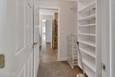 Discover this impeccably maintained pool home located on the on Plantation Bay Golf and Country Club in Florida - for sale on GolfHomes.com, golf home, golf lot