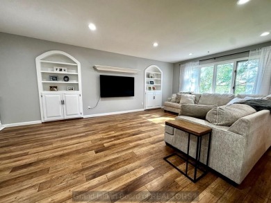 This charming home sits on a large lot with mature trees on the on Indianhead Golf Club in Nebraska - for sale on GolfHomes.com, golf home, golf lot