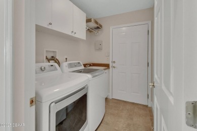 Discover this impeccably maintained pool home located on the on Plantation Bay Golf and Country Club in Florida - for sale on GolfHomes.com, golf home, golf lot