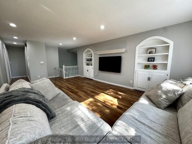 This charming home sits on a large lot with mature trees on the on Indianhead Golf Club in Nebraska - for sale on GolfHomes.com, golf home, golf lot