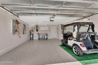 Discover this impeccably maintained pool home located on the on Plantation Bay Golf and Country Club in Florida - for sale on GolfHomes.com, golf home, golf lot