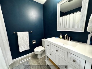 This charming home sits on a large lot with mature trees on the on Indianhead Golf Club in Nebraska - for sale on GolfHomes.com, golf home, golf lot