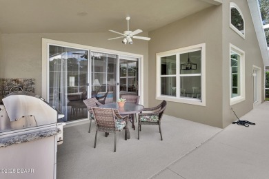 Discover this impeccably maintained pool home located on the on Plantation Bay Golf and Country Club in Florida - for sale on GolfHomes.com, golf home, golf lot