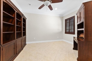 Behind a breathtaking guard-gated entrance, manicured on Parkland Golf Club in Florida - for sale on GolfHomes.com, golf home, golf lot
