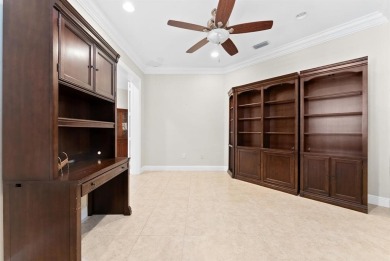 Behind a breathtaking guard-gated entrance, manicured on Parkland Golf Club in Florida - for sale on GolfHomes.com, golf home, golf lot