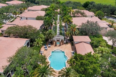 Behind a breathtaking guard-gated entrance, manicured on Parkland Golf Club in Florida - for sale on GolfHomes.com, golf home, golf lot