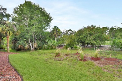Discover this impeccably maintained pool home located on the on Plantation Bay Golf and Country Club in Florida - for sale on GolfHomes.com, golf home, golf lot