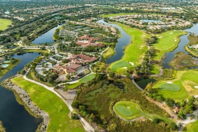 Behind a breathtaking guard-gated entrance, manicured on Parkland Golf Club in Florida - for sale on GolfHomes.com, golf home, golf lot