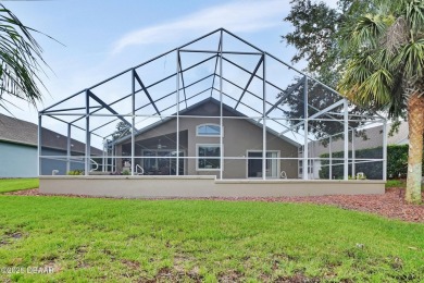 Discover this impeccably maintained pool home located on the on Plantation Bay Golf and Country Club in Florida - for sale on GolfHomes.com, golf home, golf lot