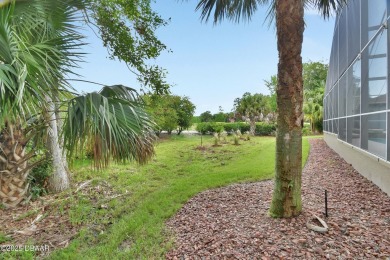 Discover this impeccably maintained pool home located on the on Plantation Bay Golf and Country Club in Florida - for sale on GolfHomes.com, golf home, golf lot