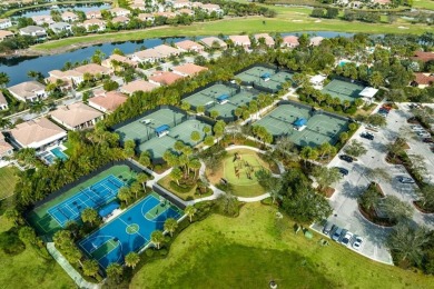 Behind a breathtaking guard-gated entrance, manicured on Parkland Golf Club in Florida - for sale on GolfHomes.com, golf home, golf lot