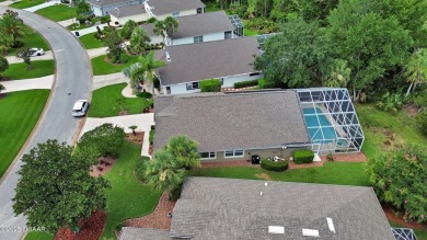 Discover this impeccably maintained pool home located on the on Plantation Bay Golf and Country Club in Florida - for sale on GolfHomes.com, golf home, golf lot