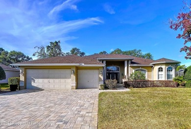 Beautifully situated 3+/3/3 pool home in upscale Silverthorn on Silverthorn Country Club in Florida - for sale on GolfHomes.com, golf home, golf lot