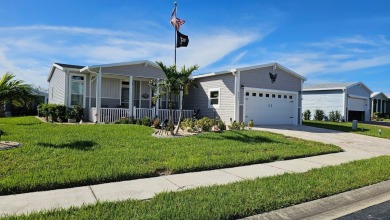 ABSOLUTELY STUNNING! This 2023 Palm Harbor Ventura Model home is on The Riverside Golf Club in Florida - for sale on GolfHomes.com, golf home, golf lot