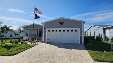 ABSOLUTELY STUNNING! This 2023 Palm Harbor Ventura Model home is on The Riverside Golf Club in Florida - for sale on GolfHomes.com, golf home, golf lot