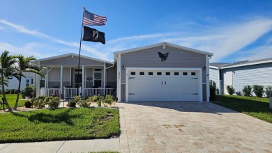 ABSOLUTELY STUNNING! This 2023 Palm Harbor Ventura Model home is on The Riverside Golf Club in Florida - for sale on GolfHomes.com, golf home, golf lot