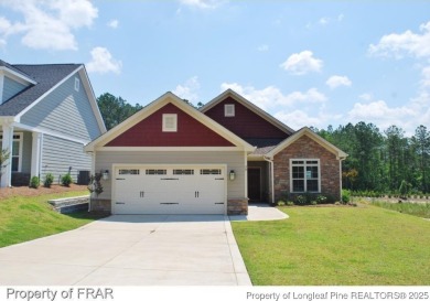 This 2-bedroom, 2-bathroom carriage home is located in the 55+ on Anderson Creek Golf Club in North Carolina - for sale on GolfHomes.com, golf home, golf lot