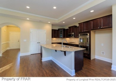 This 2-bedroom, 2-bathroom carriage home is located in the 55+ on Anderson Creek Golf Club in North Carolina - for sale on GolfHomes.com, golf home, golf lot