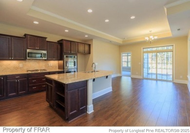 This 2-bedroom, 2-bathroom carriage home is located in the 55+ on Anderson Creek Golf Club in North Carolina - for sale on GolfHomes.com, golf home, golf lot