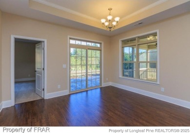 This 2-bedroom, 2-bathroom carriage home is located in the 55+ on Anderson Creek Golf Club in North Carolina - for sale on GolfHomes.com, golf home, golf lot