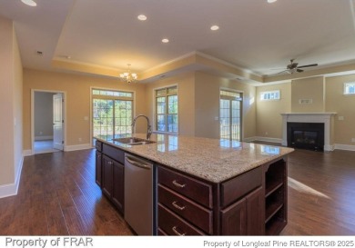 This 2-bedroom, 2-bathroom carriage home is located in the 55+ on Anderson Creek Golf Club in North Carolina - for sale on GolfHomes.com, golf home, golf lot