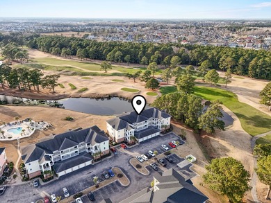 This beautifully maintained, fully furnished three-bedroom on Myrtlewood Golf Course and Club  in South Carolina - for sale on GolfHomes.com, golf home, golf lot