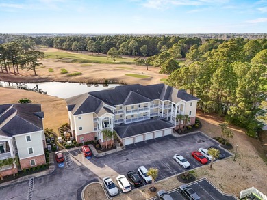 This beautifully maintained, fully furnished three-bedroom on Myrtlewood Golf Course and Club  in South Carolina - for sale on GolfHomes.com, golf home, golf lot