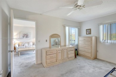 Constructed just in 1993 this 2 bedroom with 1 and a half on Flamingo Lakes Country Club in Florida - for sale on GolfHomes.com, golf home, golf lot