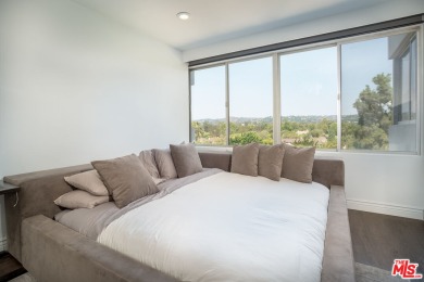 Stunning 2 bedroom condo at the luxurious Comstock Towers on Los Angeles Country Club in California - for sale on GolfHomes.com, golf home, golf lot