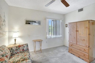 Constructed just in 1993 this 2 bedroom with 1 and a half on Flamingo Lakes Country Club in Florida - for sale on GolfHomes.com, golf home, golf lot