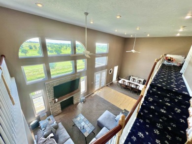 Luxury living meets breathtaking views at this stunning property on Deer Run Golf Course in Iowa - for sale on GolfHomes.com, golf home, golf lot