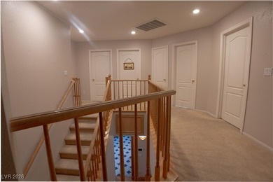 Tucked at the end of a quiet cul-de-sac in the heart of Southern on Southern Highlands Golf Club in Nevada - for sale on GolfHomes.com, golf home, golf lot