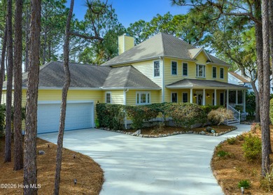 Nestled in St. James Plantation, this spacious home sits on a on Members Club At St. James Plantation in North Carolina - for sale on GolfHomes.com, golf home, golf lot