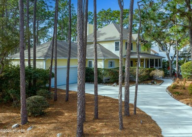 Nestled in St. James Plantation, this spacious home sits on a on Members Club At St. James Plantation in North Carolina - for sale on GolfHomes.com, golf home, golf lot
