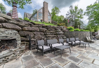 Indulge in the epitome of lakeside living with this exquisite on Scranton Canoe Club in Pennsylvania - for sale on GolfHomes.com, golf home, golf lot