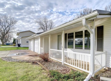 Tee off to easy living perfectly situated on beautiful Country on Country Greens Golf Course in Iowa - for sale on GolfHomes.com, golf home, golf lot