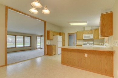 Tee off to easy living perfectly situated on beautiful Country on Country Greens Golf Course in Iowa - for sale on GolfHomes.com, golf home, golf lot