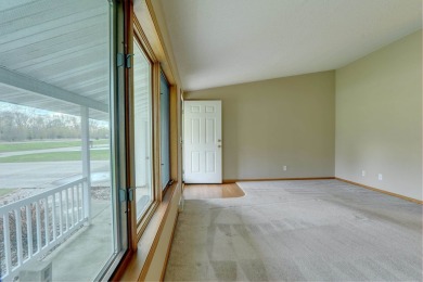 Tee off to easy living perfectly situated on beautiful Country on Country Greens Golf Course in Iowa - for sale on GolfHomes.com, golf home, golf lot