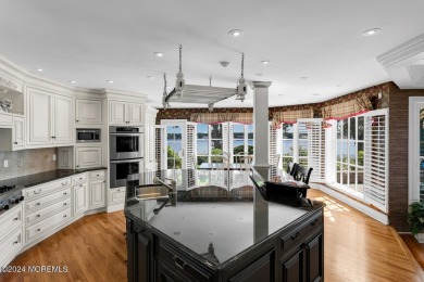 This stunning 5-bedroom, 5.5-bathroom English Tudor waterfront on Navesink Country Club in New Jersey - for sale on GolfHomes.com, golf home, golf lot