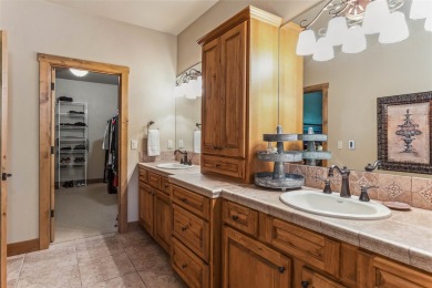 Come explore this stunning single-level residence on the 10th on Eagle Bend Golf Course in Montana - for sale on GolfHomes.com, golf home, golf lot