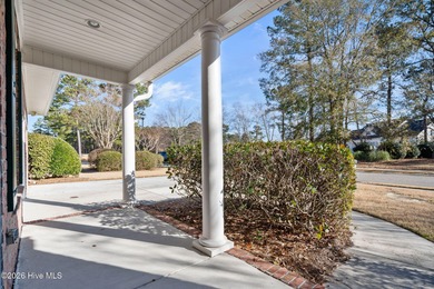 Welcome home to this beautiful 5-bedroom, 3-bath brick residence on Magnolia Greens Golf Plantation in North Carolina - for sale on GolfHomes.com, golf home, golf lot