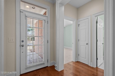 Welcome home to this beautiful 5-bedroom, 3-bath brick residence on Magnolia Greens Golf Plantation in North Carolina - for sale on GolfHomes.com, golf home, golf lot