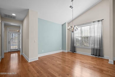 Welcome home to this beautiful 5-bedroom, 3-bath brick residence on Magnolia Greens Golf Plantation in North Carolina - for sale on GolfHomes.com, golf home, golf lot